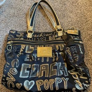 Black and gold Coach tote